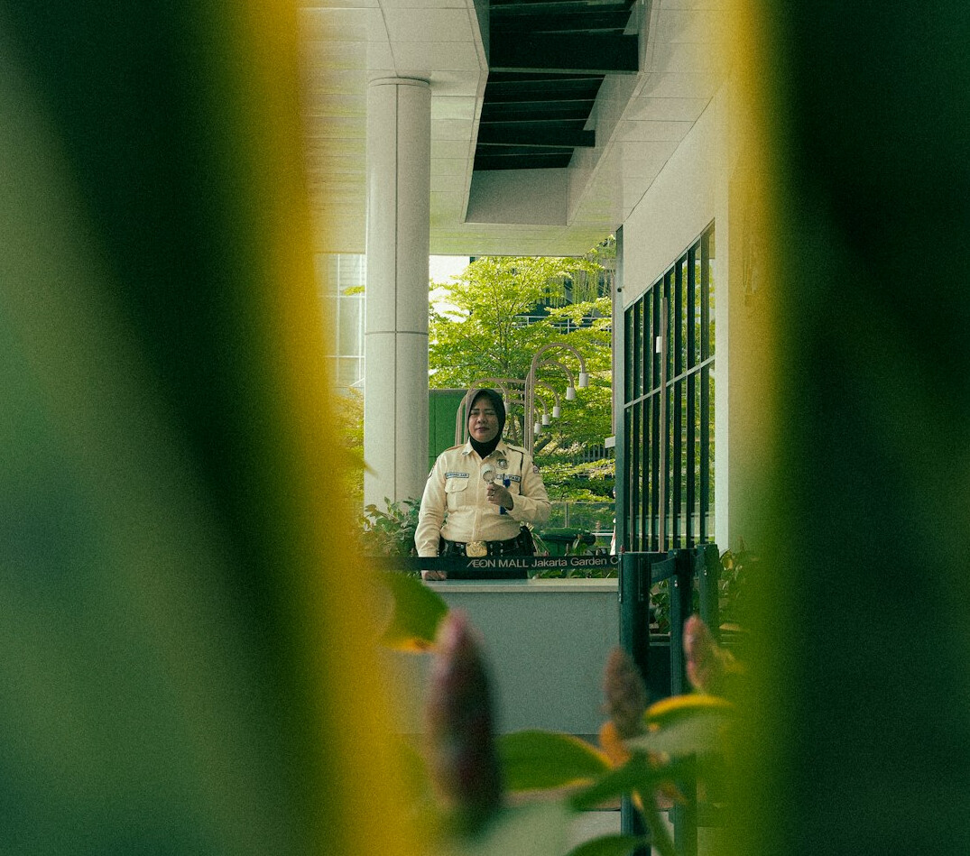store detective watching customer