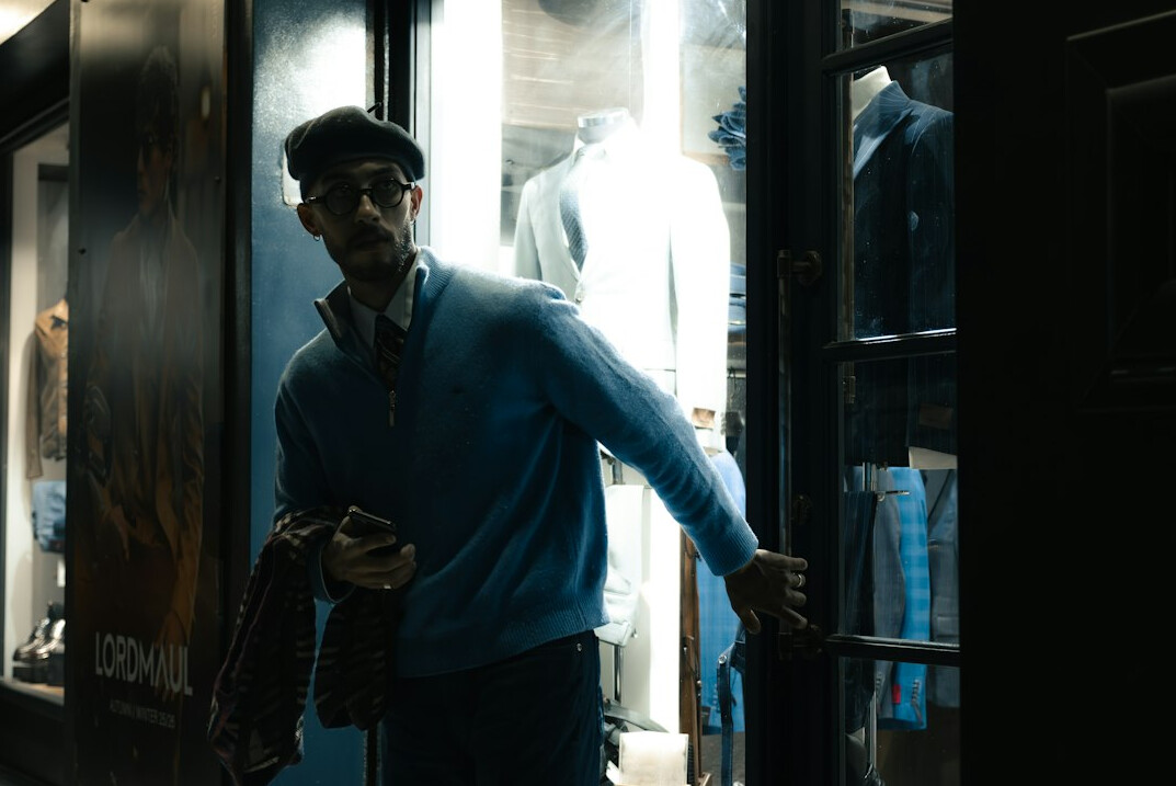 store detective watching customers