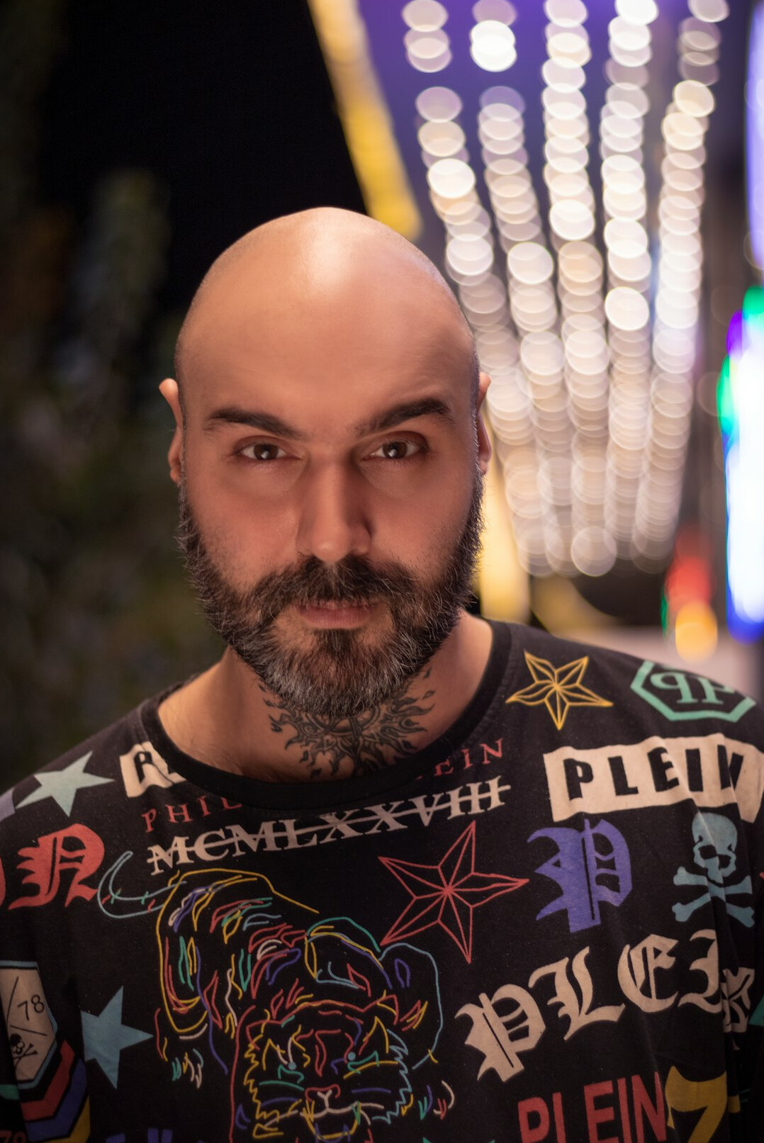 Portrait of a man with short hair and a beard