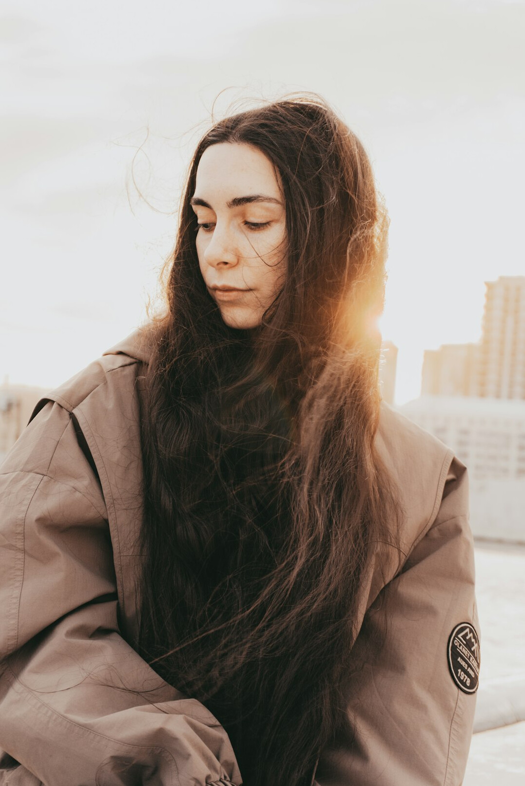 Portrait of a woman with long hair smiling